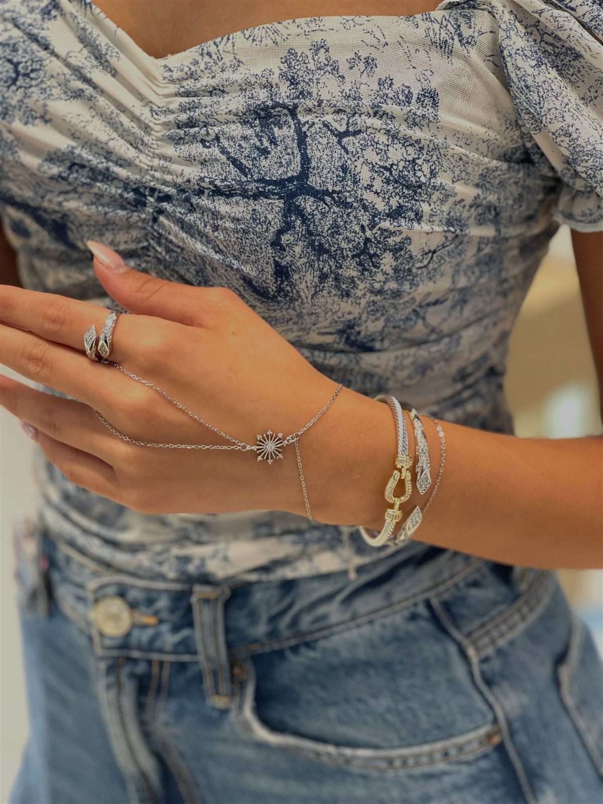 Stack of gold-plated bracelets